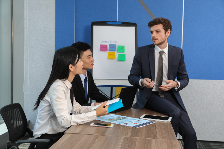 CLP employees in a meeting