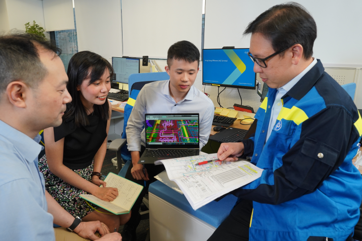 CLP employees in a meeting